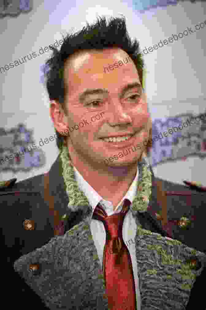 A Portrait Of Craig Revel Horwood Smiling And Looking Confident. In Strictest Confidence Craig Revel Horwood