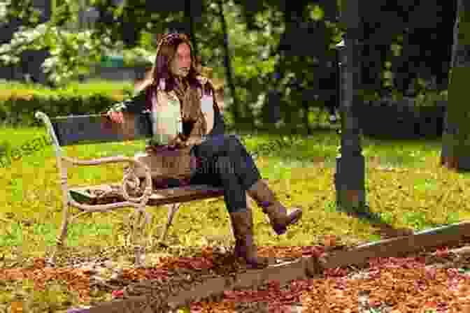 A Woman Sitting On A Bench In A Park, Surrounded By Vibrant Autumn Leaves, Her Face Filled With A Mix Of Sadness And Longing. Seven Perfect Things: A Novel